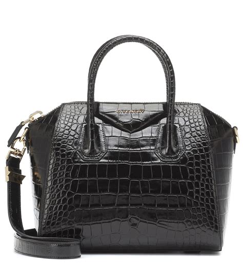 givenchy antigona pouch street style|Givenchy crocodile antigona.